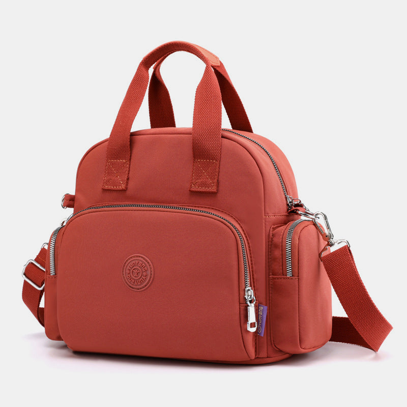 3-Way Use Backpack with USB Charging Port – Versatile Nylon Travel & School Bag for Women