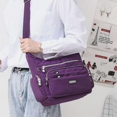 Bolso bandolera de nailon impermeable con múltiples bolsillos