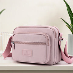 4-Zip Crossbody Bag – Lightweight Nylon Purse for Women