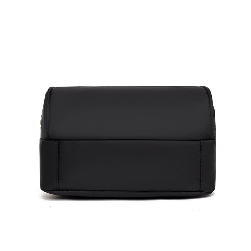 Black Oxford Backpack - Durable and casual, perfect for outdoor activities.