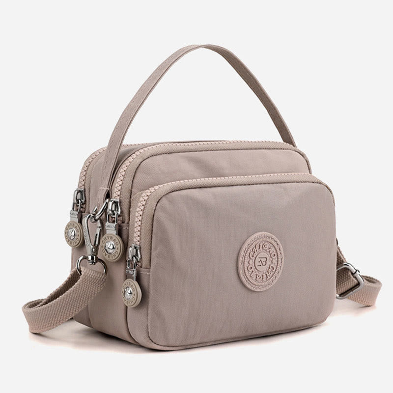 Small Nylon Crossbody Bag for Women – Triple Compartment Travel Purse