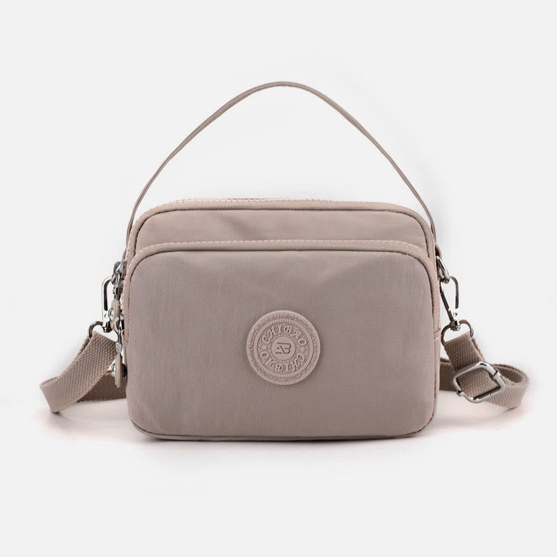 Small Nylon Crossbody Bag for Women – Triple Compartment Travel Purse