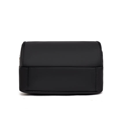 Black Oxford Backpack - Durable and casual, perfect for outdoor activities.