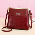 Women’s Leather Crossbody Handbag – Double Compartment Kiss Lock Shoulder Bag