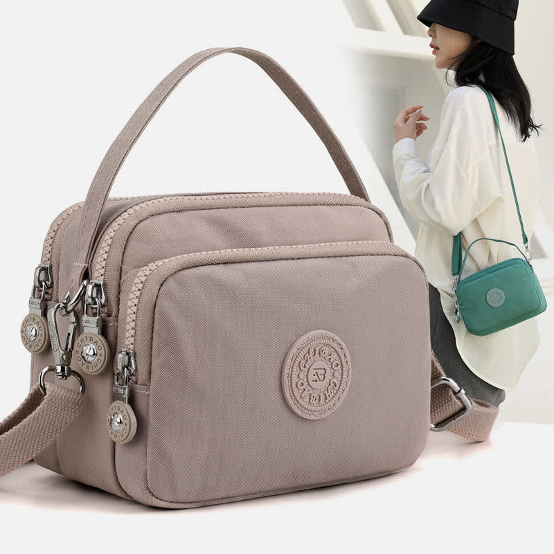 Small Nylon Crossbody Bag for Women – Triple Compartment Travel Purse
