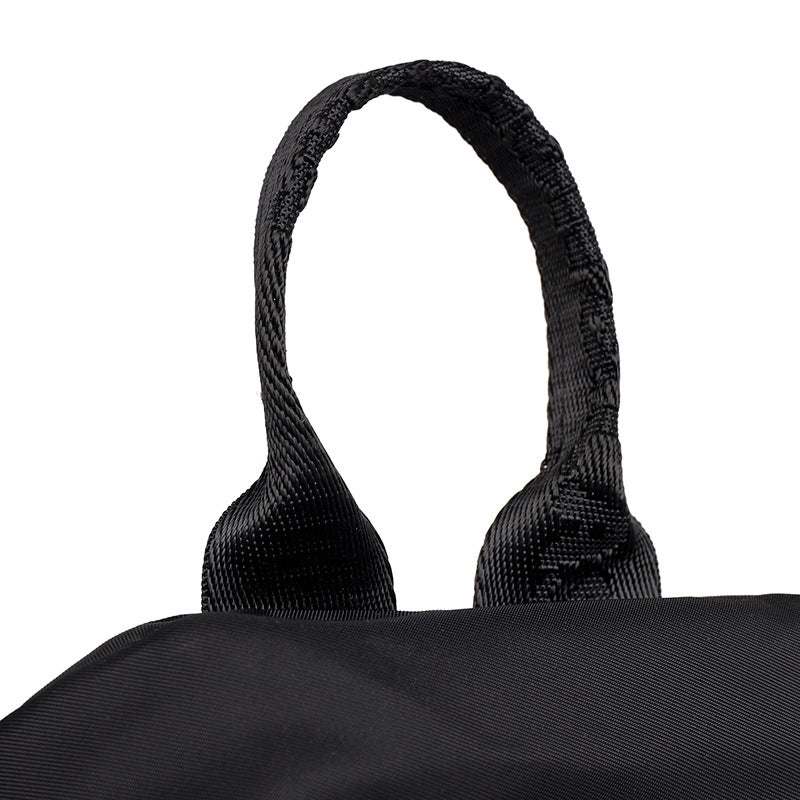 Black Oxford Backpack - Durable and casual, perfect for outdoor activities.