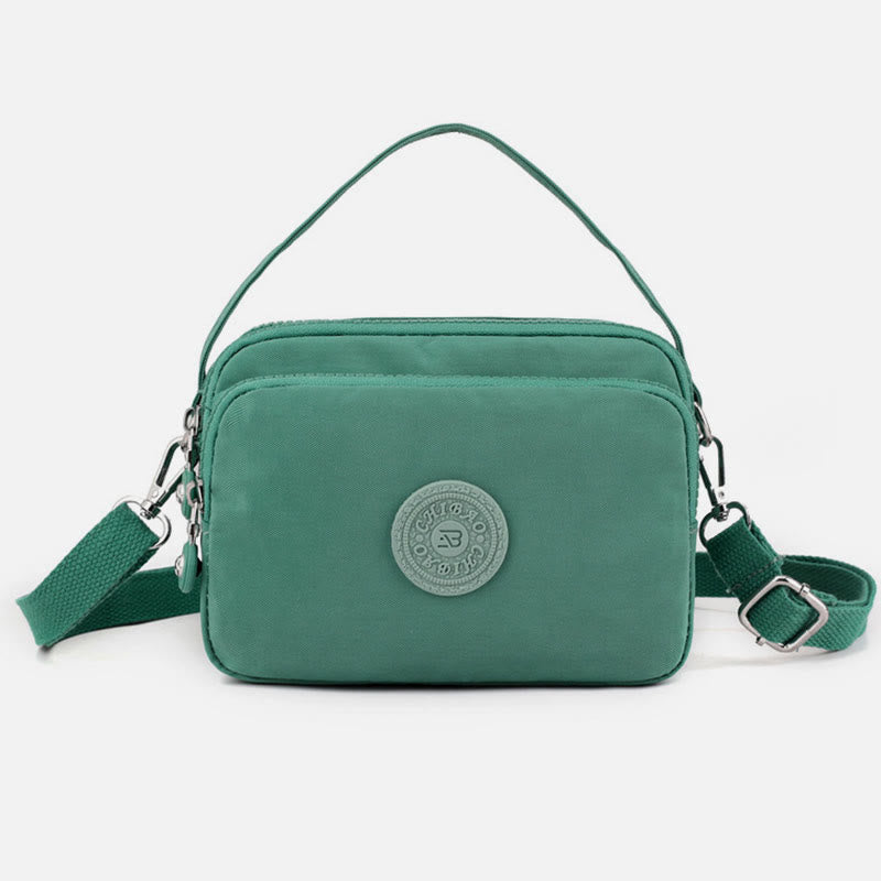 Small Nylon Crossbody Bag for Women – Triple Compartment Travel Purse