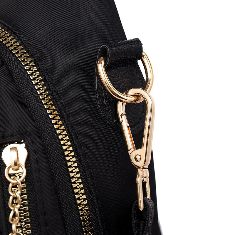 Black Oxford Backpack - Durable and casual, perfect for outdoor activities.