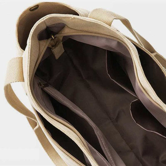 Bolso de hombro de lona de gran capacidad: bolso multibolsillos para ir de compras, viajar y uso diario.